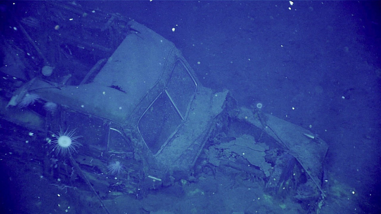 Why was a car inside a sunk World War II aircraft carrier? NOAA researchers perplexed