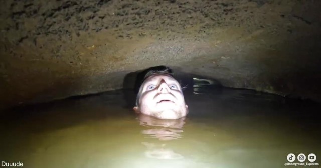 Cave diver nearly drowns squeezing through submerged tunnel in terrifying clip