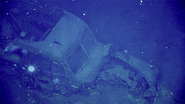 Why was a car inside a sunk World War II aircraft carrier? NOAA researchers perplexed